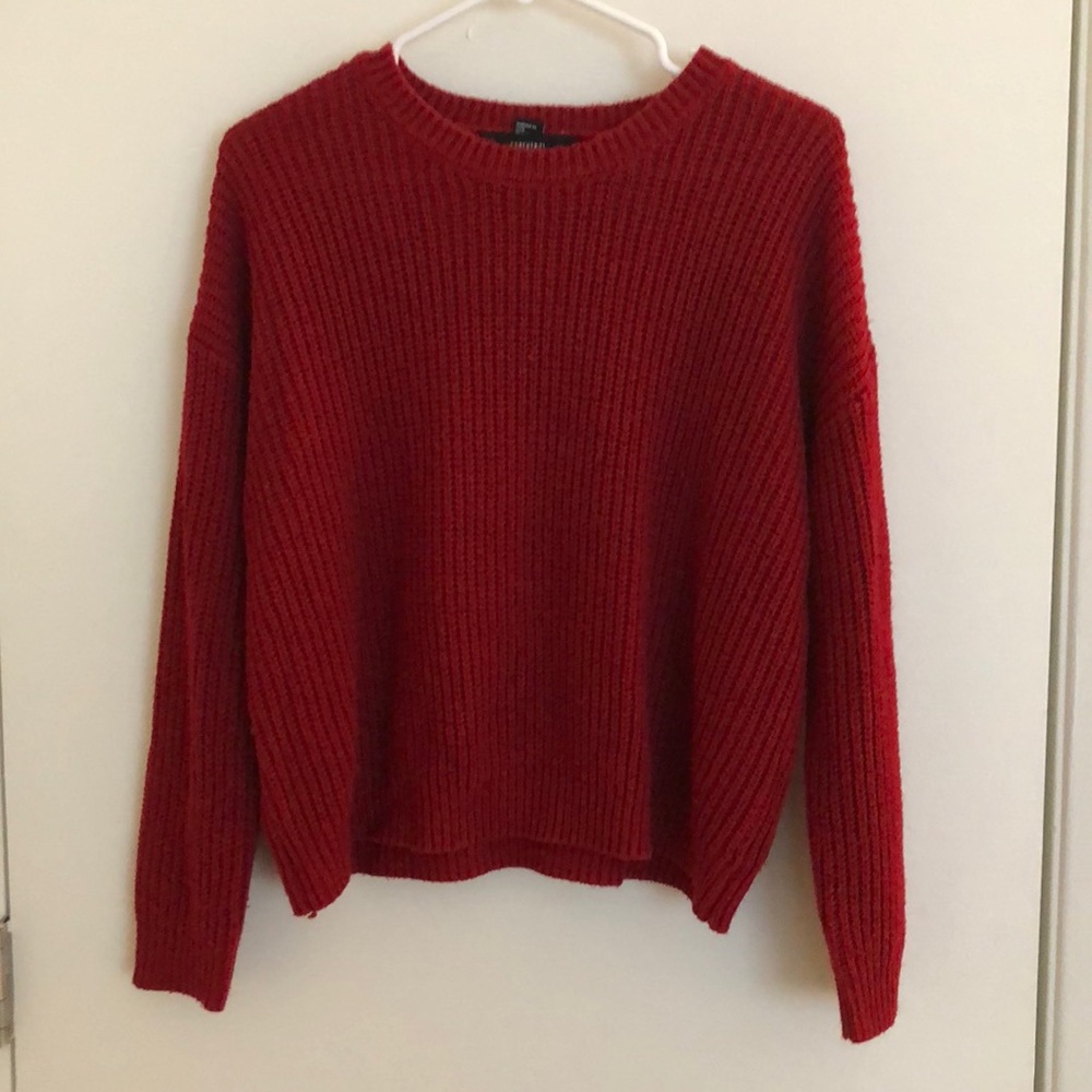 Bright red sweater